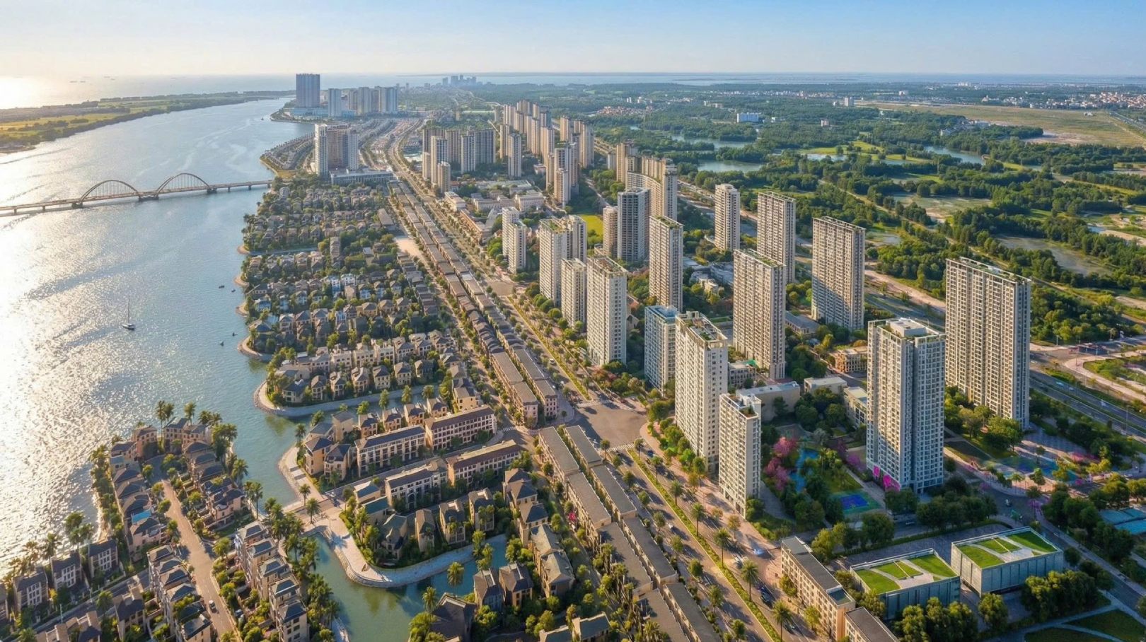 Toàn cảnh đô thị ven sông với các tòa căn hộ cao tầng và biệt thự thấp tầng tại Vinhomes Cần Giờ